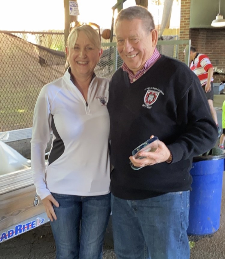 Current President Andrea Matthews presented Rich  Cecchetti with his Hall of Fame award at the 80's Alumni Day game and celebration.. 