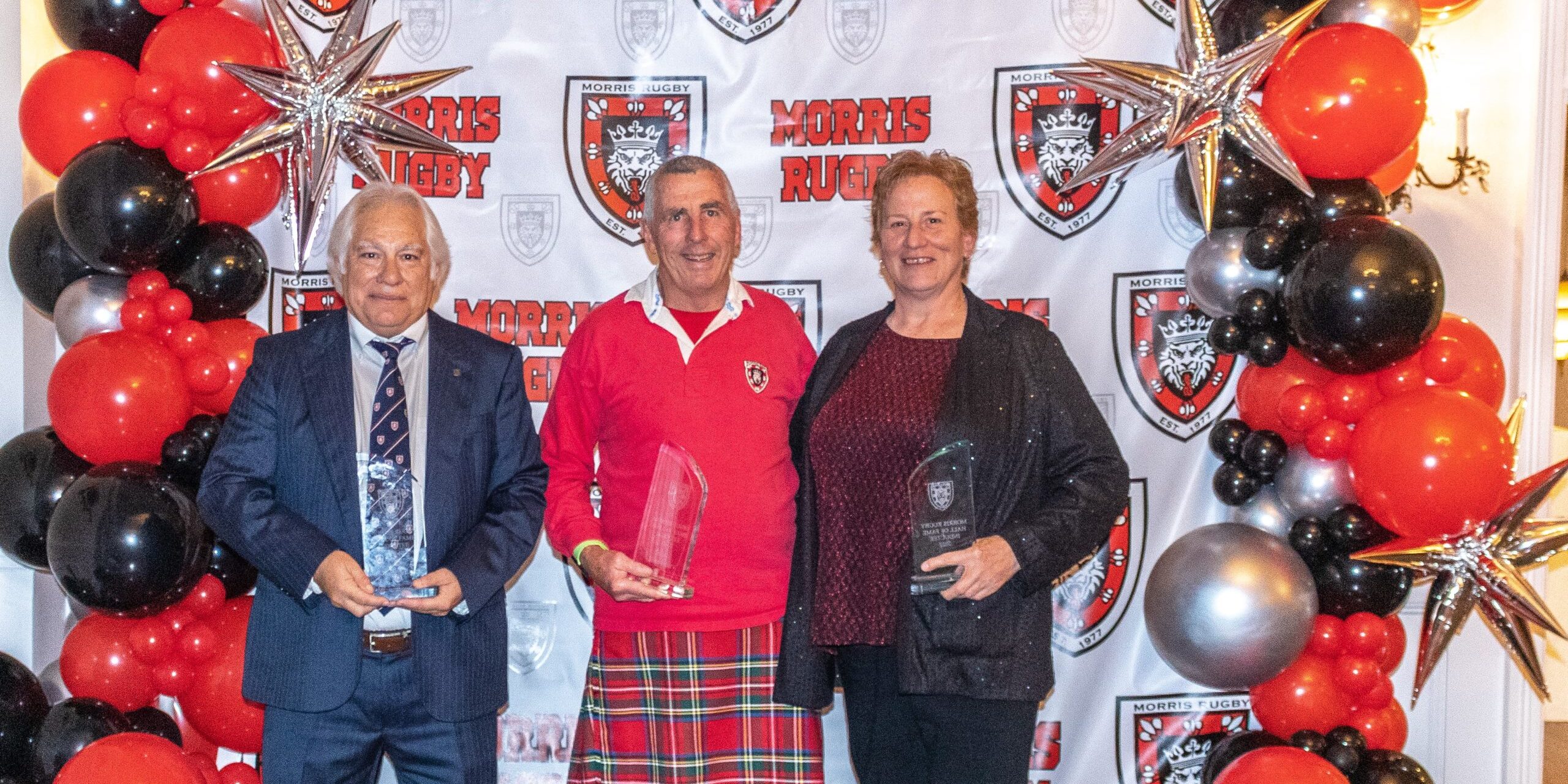 Hall of Fame inductees John Sutherland, Tom Feury and Trish McEniry during their induction at the 45th Anniversary Gala 